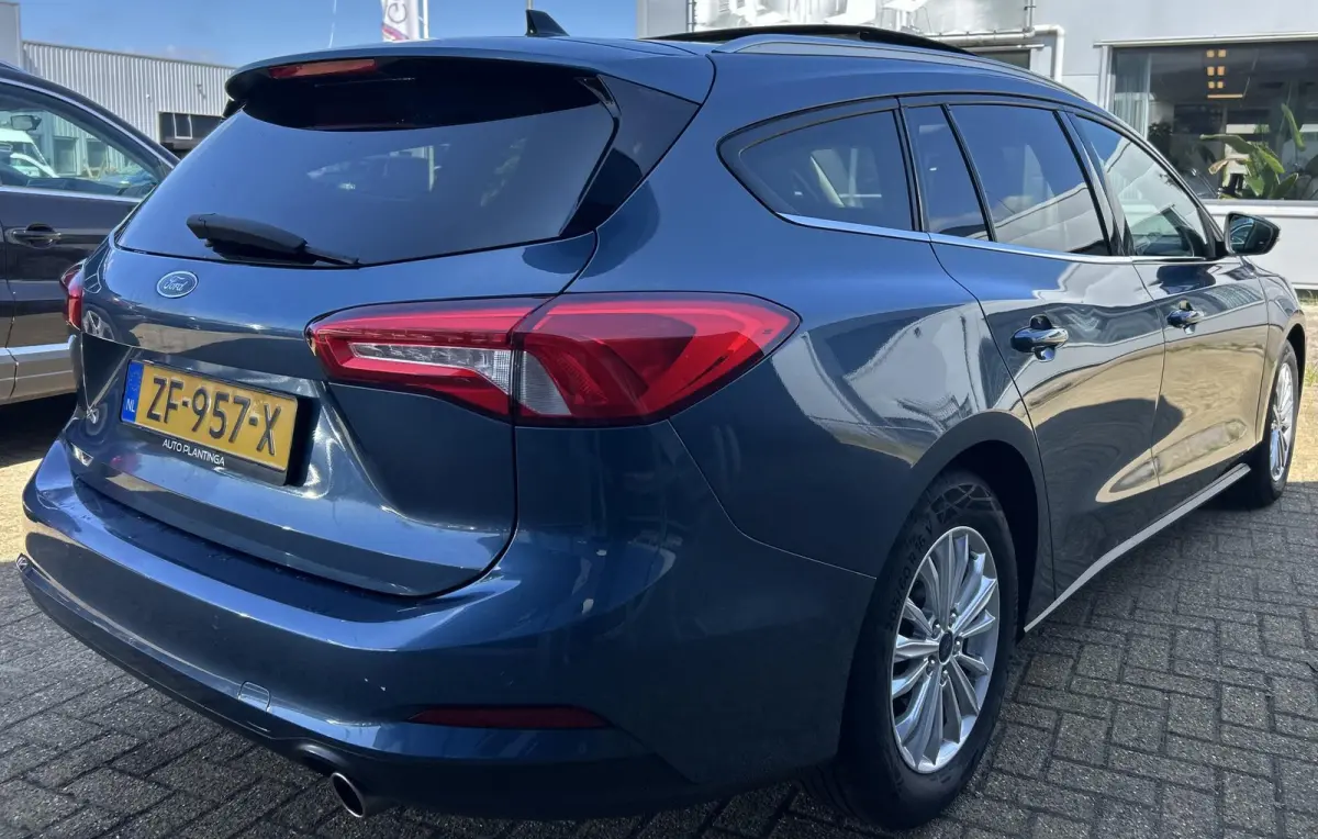 1.0 EcoBoost Titanium Business 125PK | PANO | 2e Eigenaar | NL AUTO | Onderhoudshistorie | NAP | Elektrische Achterklep | Parkeersensoren | Winter Pack | Stoel Stuur en Voorruitverwarming | 