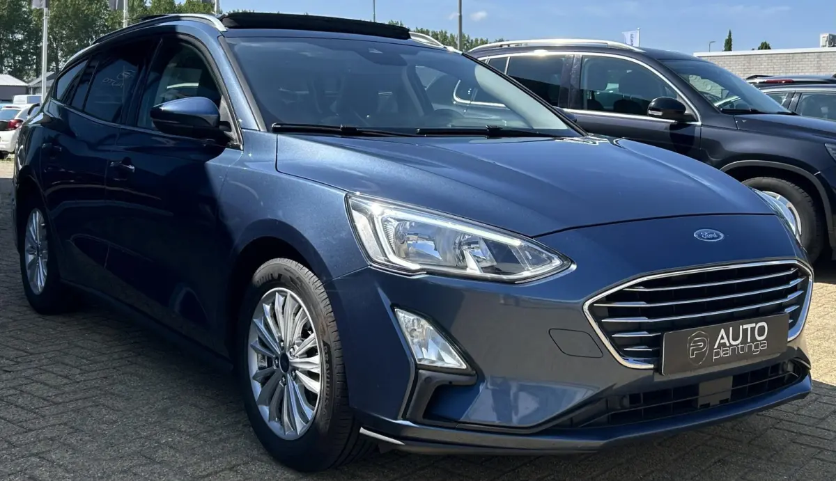 1.0 EcoBoost Titanium Business 125PK | PANO | 2e Eigenaar | NL AUTO | Onderhoudshistorie | NAP | Elektrische Achterklep | Parkeersensoren | Winter Pack | Stoel Stuur en Voorruitverwarming | 