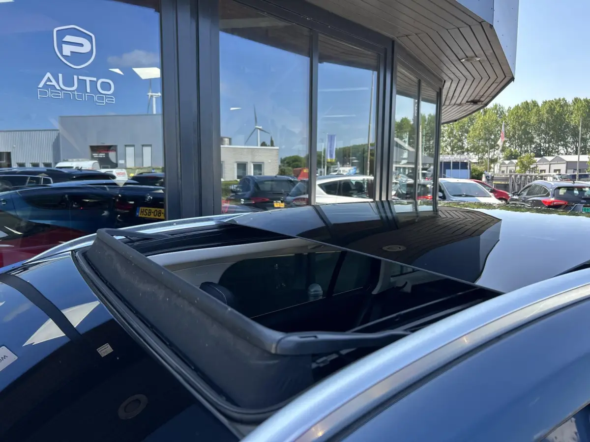 1.0 EcoBoost Titanium Business 125PK | PANO | 2e Eigenaar | NL AUTO | Onderhoudshistorie | NAP | Elektrische Achterklep | Parkeersensoren | Winter Pack | Stoel Stuur en Voorruitverwarming | 
