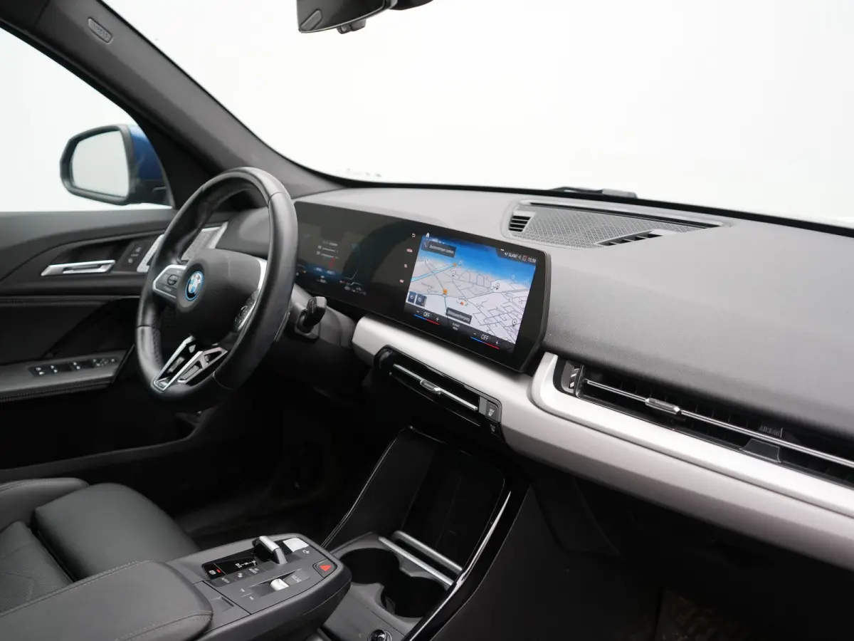 xDrive25e Sportline PHEV 245pk Dealer O.H. | Trekhaak Af Fabriek | Adaptive Cruise | Camera | Harman / Kardon | Lederen Sportstoelen Massage & Memory | Sfeerverlichting | Keyless | Blis | St