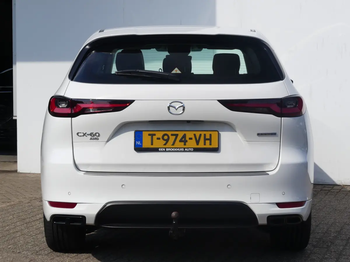 2.5 e-SkyActiv PHEV Homura | TREKHAAK | CAMERA | STUUR+STOELVERWARMING | STOELVENTILATIE | DODEHOEKDETECTIE | ELEKTRISCH VERSTELBARE BESTUURDERSSTOEL MET GEHEUGEN | PARKEERSENSOREN V+A | HEA