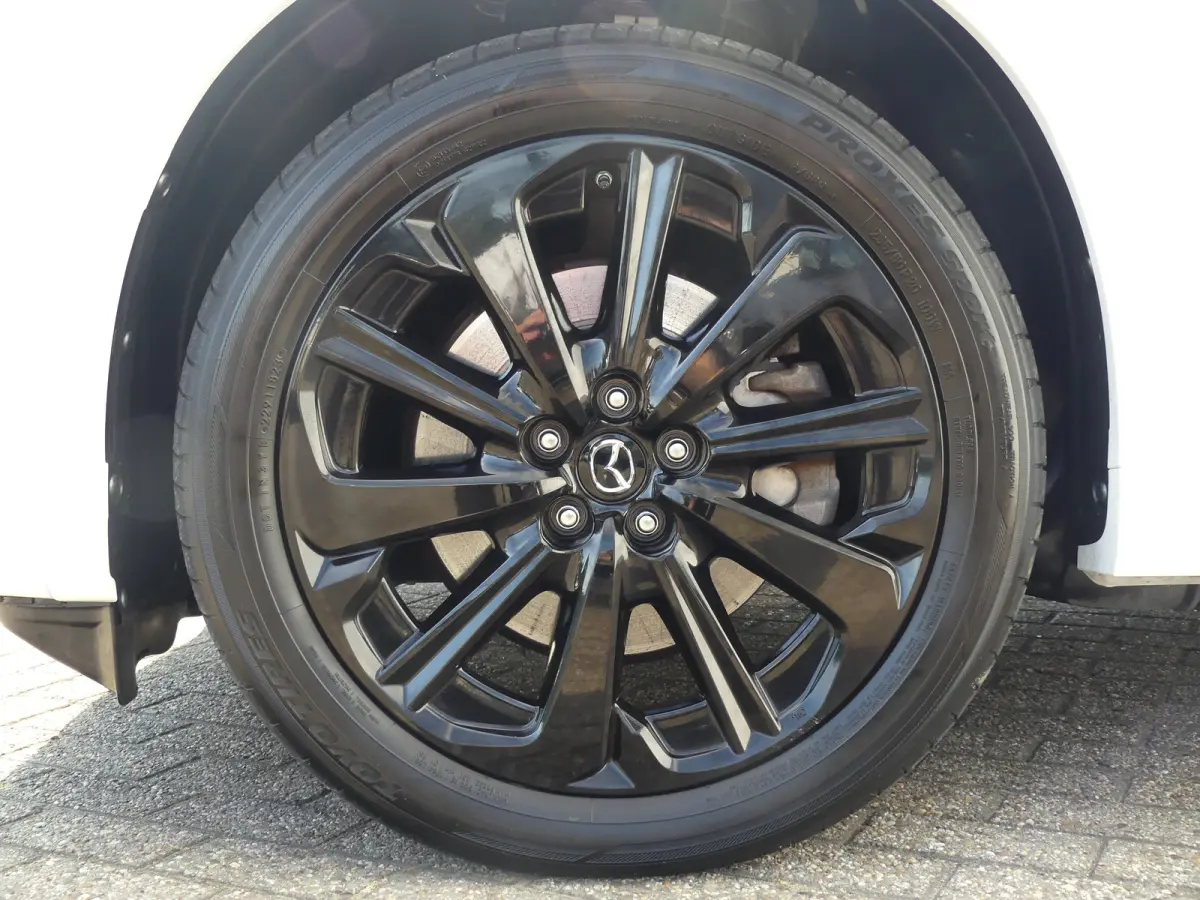 2.5 e-SkyActiv PHEV Homura | TREKHAAK | CAMERA | STUUR+STOELVERWARMING | STOELVENTILATIE | DODEHOEKDETECTIE | ELEKTRISCH VERSTELBARE BESTUURDERSSTOEL MET GEHEUGEN | PARKEERSENSOREN V+A | HEA
