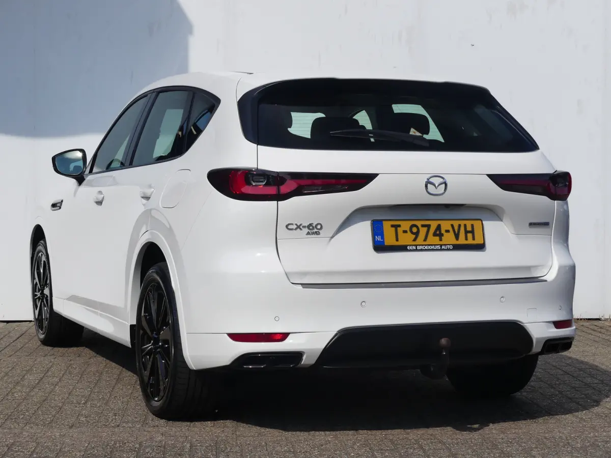 2.5 e-SkyActiv PHEV Homura | TREKHAAK | CAMERA | STUUR+STOELVERWARMING | STOELVENTILATIE | DODEHOEKDETECTIE | ELEKTRISCH VERSTELBARE BESTUURDERSSTOEL MET GEHEUGEN | PARKEERSENSOREN V+A | HEA