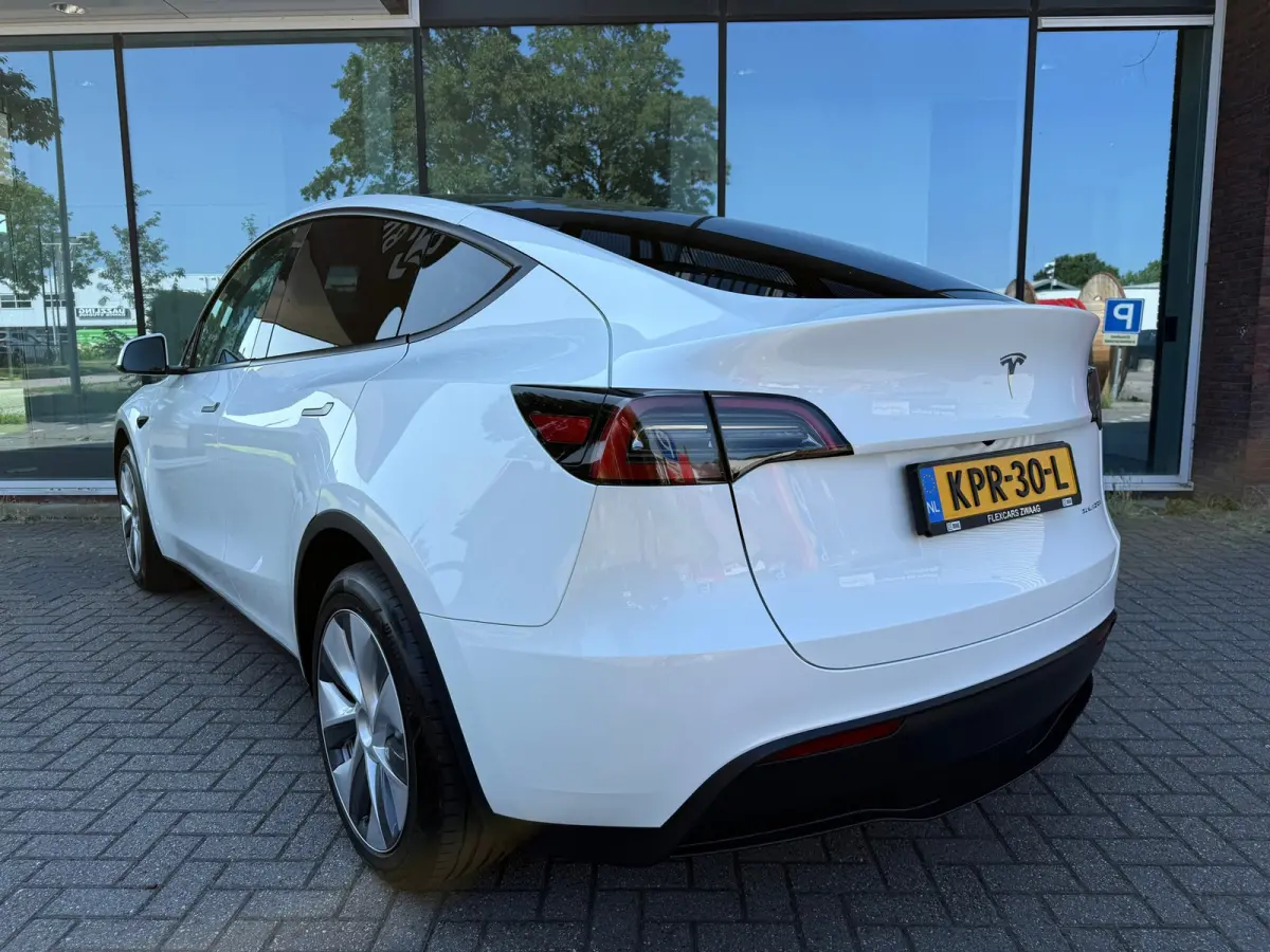 Long Range AWD 75 kWh - Automaat - Panoramadak - Navi - Parkeerhulp