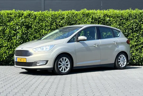 1.5 Titanium, NAVIGATIE, CRUISE CONTROL, CLIMATE CONTROL, STOEL/STUURVERWARMING, PDC, TREKHAAK, LICHTMETAAL 16", EXTRA SET 16"