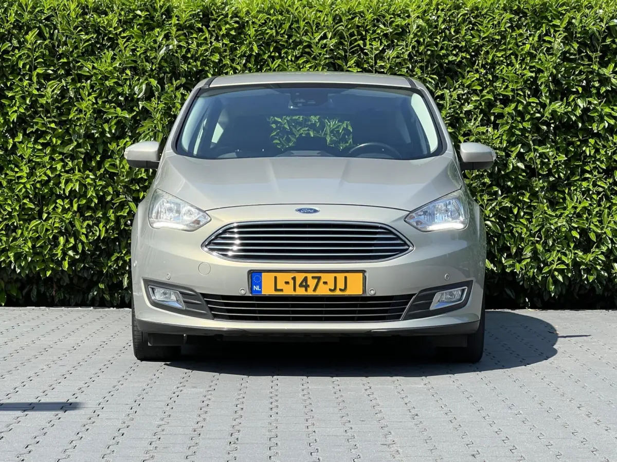 1.5 Titanium, NAVIGATIE, CRUISE CONTROL, CLIMATE CONTROL, STOEL/STUURVERWARMING, PDC, TREKHAAK, LICHTMETAAL 16", EXTRA SET 16"
