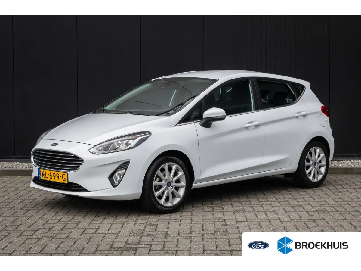 1.0 EcoBoost Titanium | 100% dealer onderhouden | Navigatie incl. bluetooth | Cruise control | Climate controle | DAB - audio