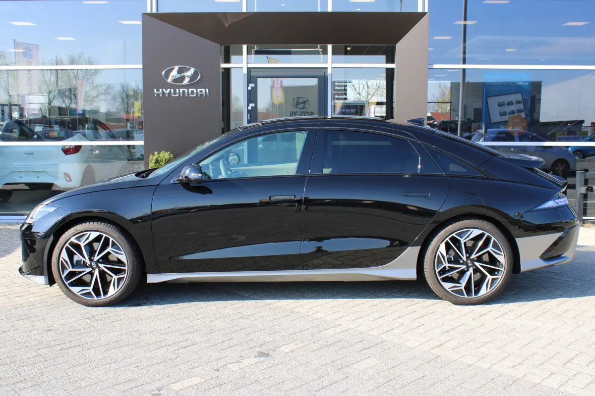 Lounge AWD 77 kWh | 1500KG trekgewicht | V2L | Elektrische stoelverstelling met geheugenfunctie | verwarming / ventilatie in voorstoelen | BOSE Audio | 360 graden camera | | Achterspoiler | 