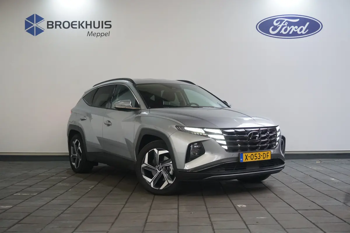 1.6 T-GDI PHEV Comfort Smart 4WD | Achteruitrijcamera | Cruise control adaptief met Stop&Go | Elektrisch bedienbare achterklep met sensorsturing