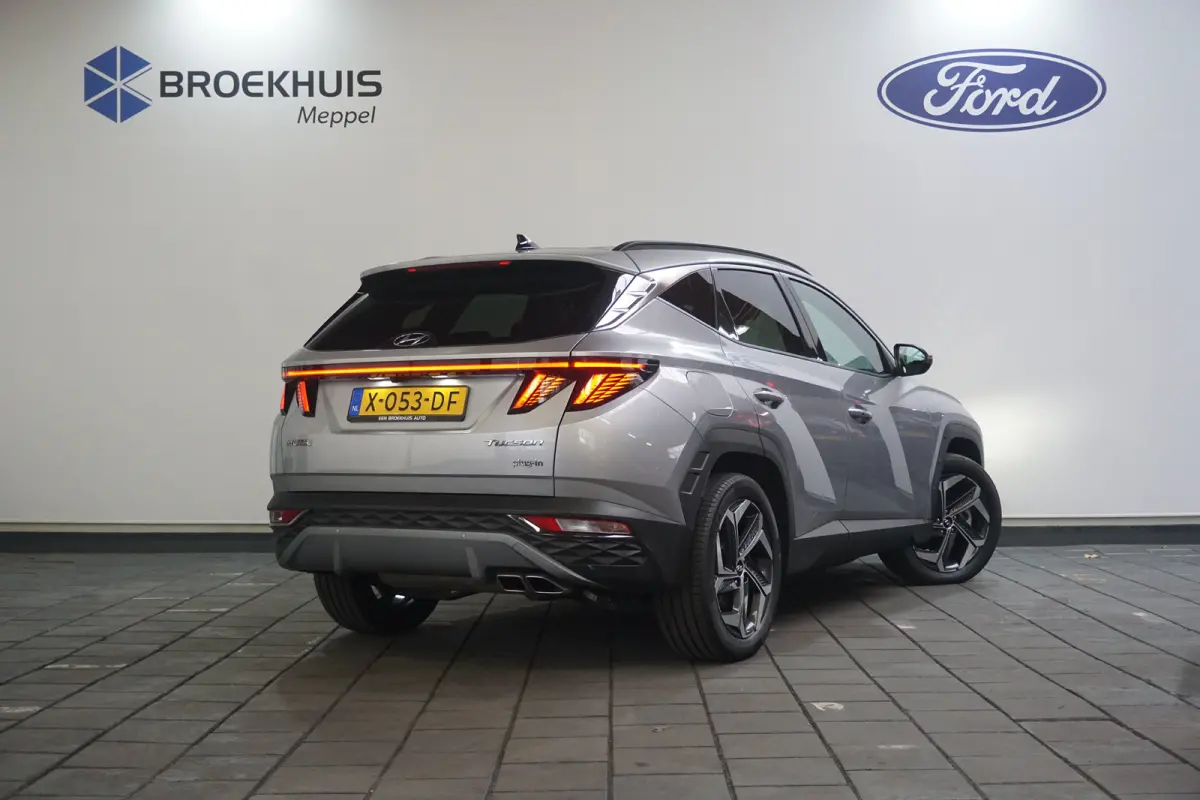 1.6 T-GDI PHEV Comfort Smart 4WD | Achteruitrijcamera | Cruise control adaptief met Stop&Go | Elektrisch bedienbare achterklep met sensorsturing