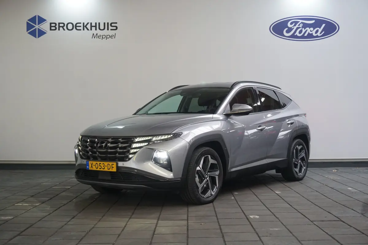 1.6 T-GDI PHEV Comfort Smart 4WD | Achteruitrijcamera | Cruise control adaptief met Stop&Go | Elektrisch bedienbare achterklep met sensorsturing