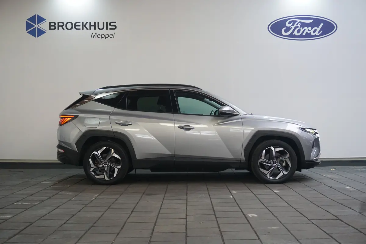 1.6 T-GDI PHEV Comfort Smart 4WD | Achteruitrijcamera | Cruise control adaptief met Stop&Go | Elektrisch bedienbare achterklep met sensorsturing