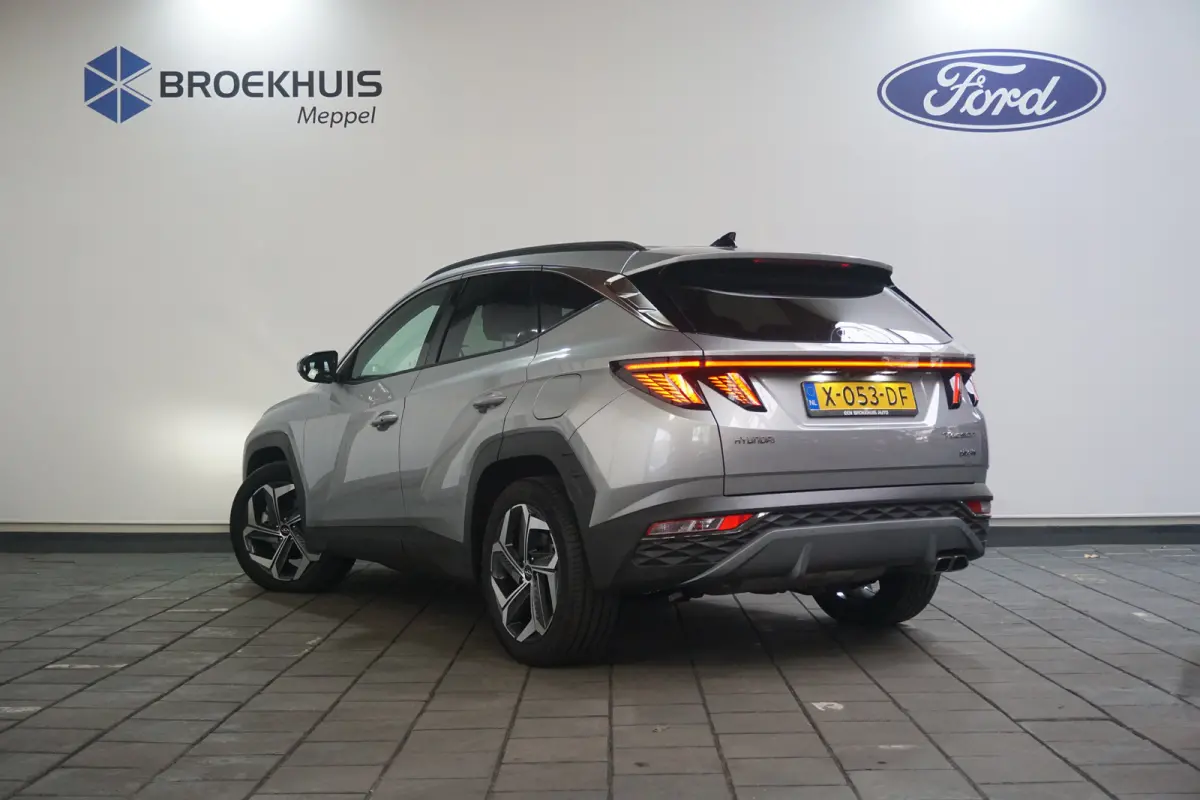 1.6 T-GDI PHEV Comfort Smart 4WD | Achteruitrijcamera | Cruise control adaptief met Stop&Go | Elektrisch bedienbare achterklep met sensorsturing