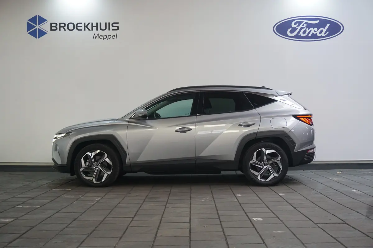 1.6 T-GDI PHEV Comfort Smart 4WD | Achteruitrijcamera | Cruise control adaptief met Stop&Go | Elektrisch bedienbare achterklep met sensorsturing