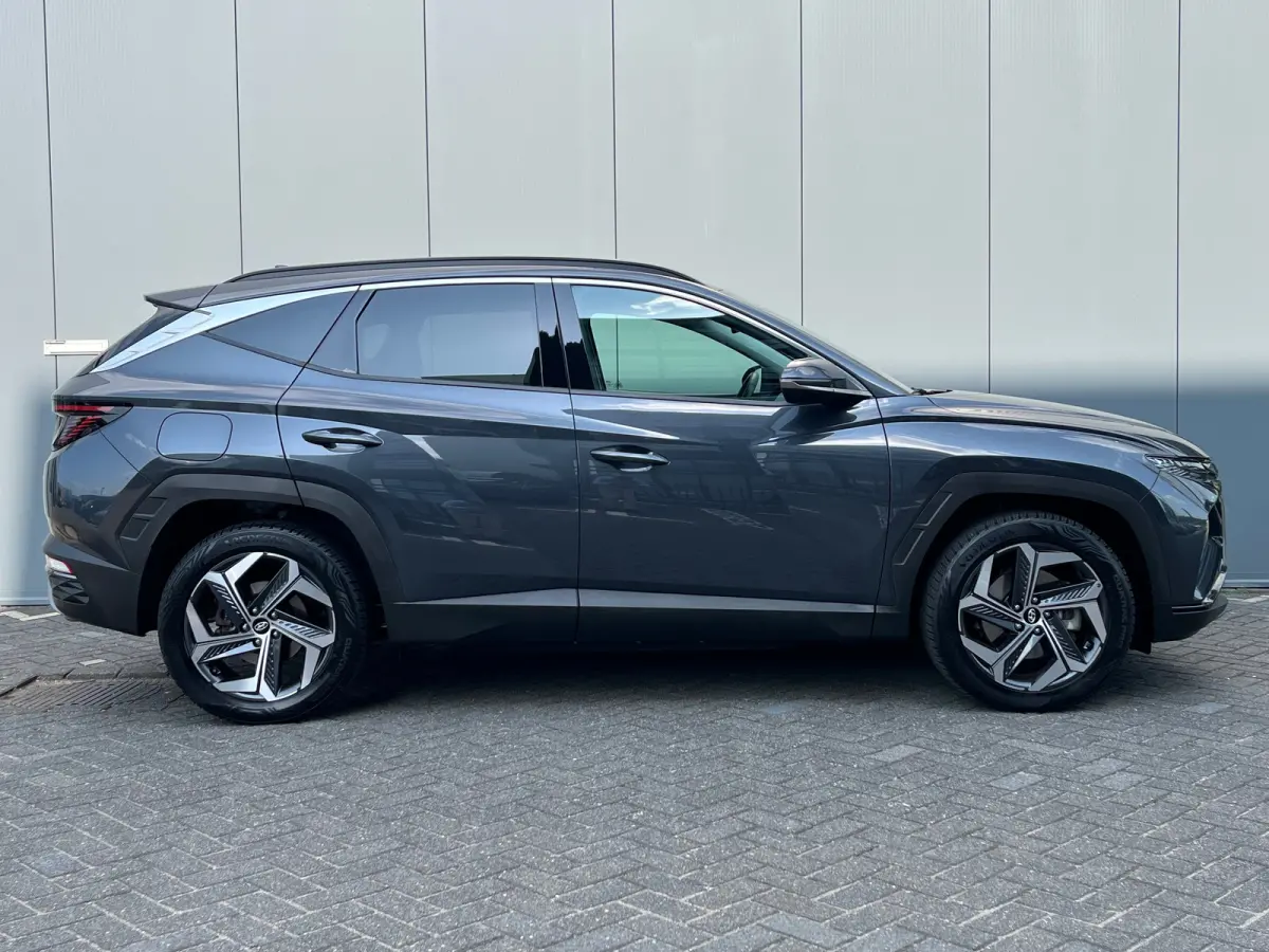 1.6 T-GDI 265pk PHEV Comfort Smart 4WD | Climate | Camera | Carplay | Keyless | Navigatie | Full - Led | Elek. Klep | Winterpakket | 19" Lichtmetaal | Krell Audio | Digitale Cockpit | Parkee