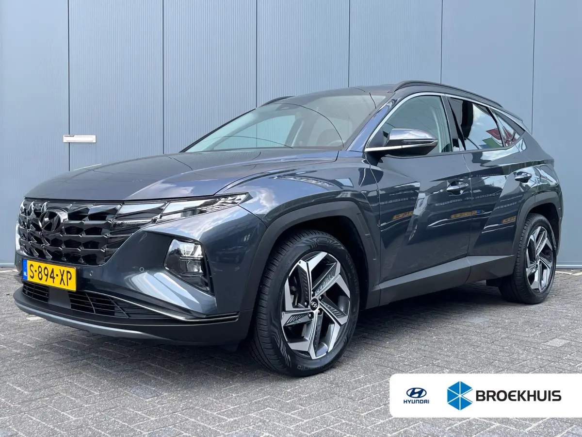 1.6 T-GDI 265pk PHEV Comfort Smart 4WD | Climate | Camera | Carplay | Keyless | Navigatie | Full - Led | Elek. Klep | Winterpakket | 19" Lichtmetaal | Krell Audio | Digitale Cockpit | Parkee