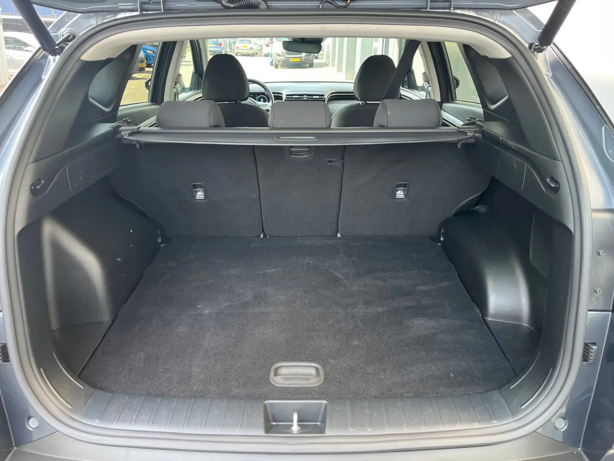 1.6 T-GDI 265pk PHEV Comfort Smart 4WD | Climate | Camera | Carplay | Keyless | Navigatie | Full - Led | Elek. Klep | Winterpakket | 19" Lichtmetaal | Krell Audio | Digitale Cockpit | Parkee