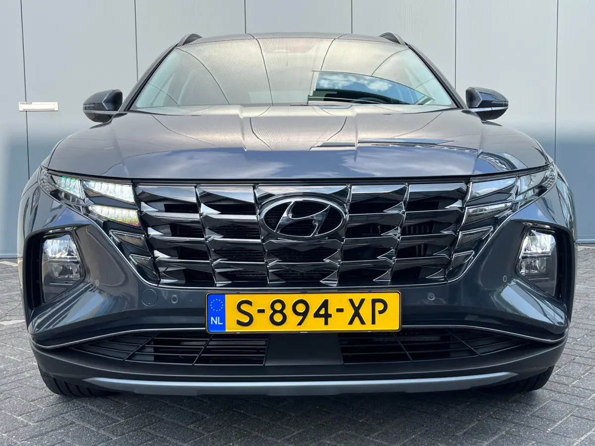 1.6 T-GDI 265pk PHEV Comfort Smart 4WD | Climate | Camera | Carplay | Keyless | Navigatie | Full - Led | Elek. Klep | Winterpakket | 19" Lichtmetaal | Krell Audio | Digitale Cockpit | Parkee