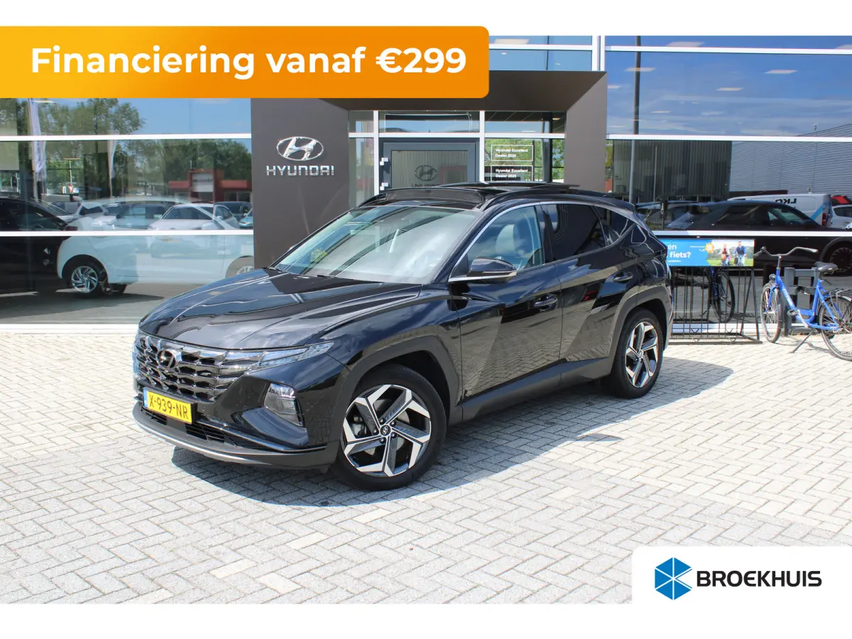 1.6 T-GDI 265pk PHEV Premium Sky 4WD | Schuifkanteldak | 360 camera | Lederen bekleding | | Achterbank verwarmd | Achteruitrij assistent | Airco (automatisch)