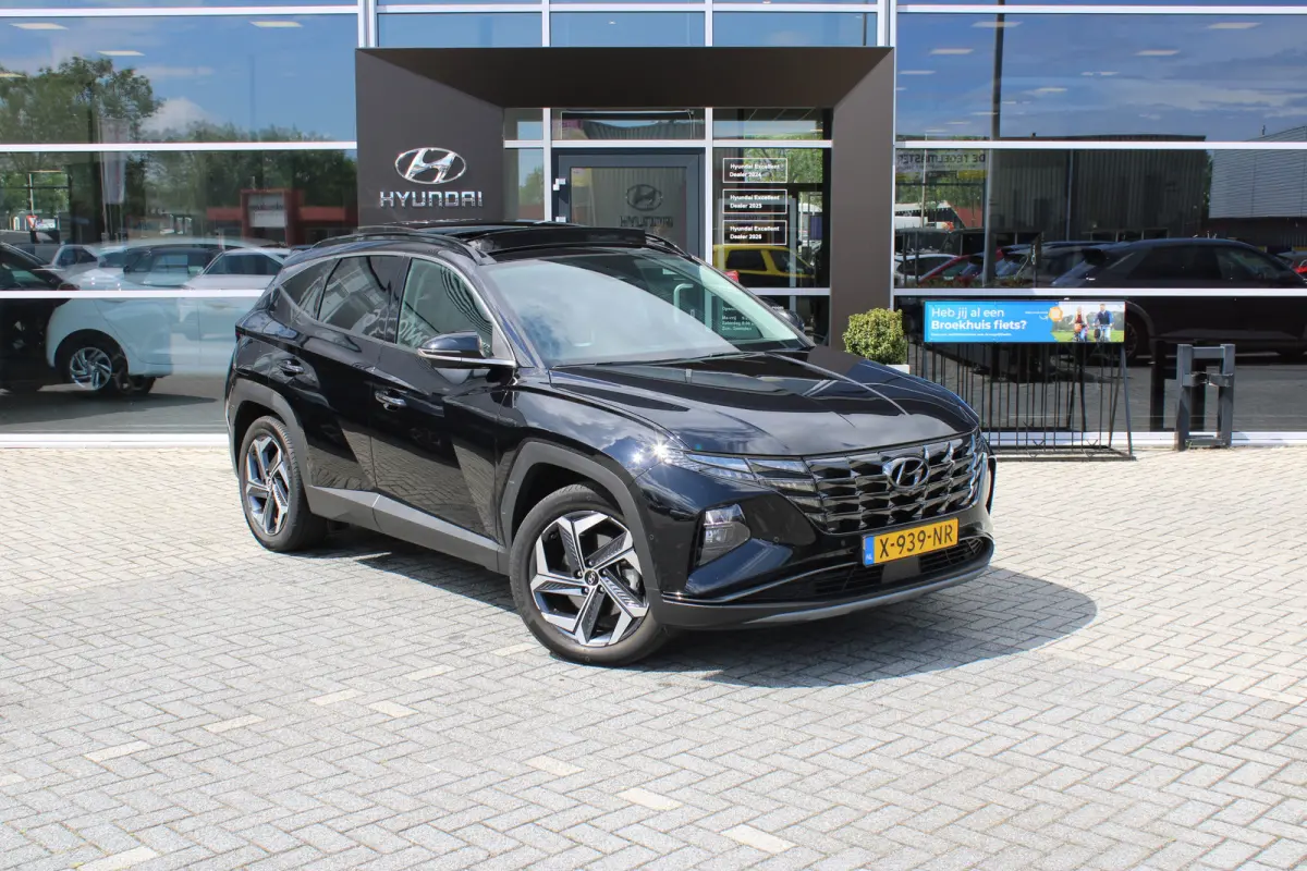 1.6 T-GDI 265pk PHEV Premium Sky 4WD | Schuifkanteldak | 360 camera | Lederen bekleding | | Achterbank verwarmd | Achteruitrij assistent | Airco (automatisch)