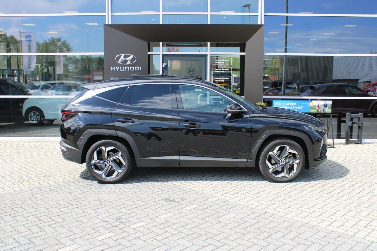 1.6 T-GDI 265pk PHEV Premium Sky 4WD | Schuifkanteldak | 360 camera | Lederen bekleding | | Achterbank verwarmd | Achteruitrij assistent | Airco (automatisch)