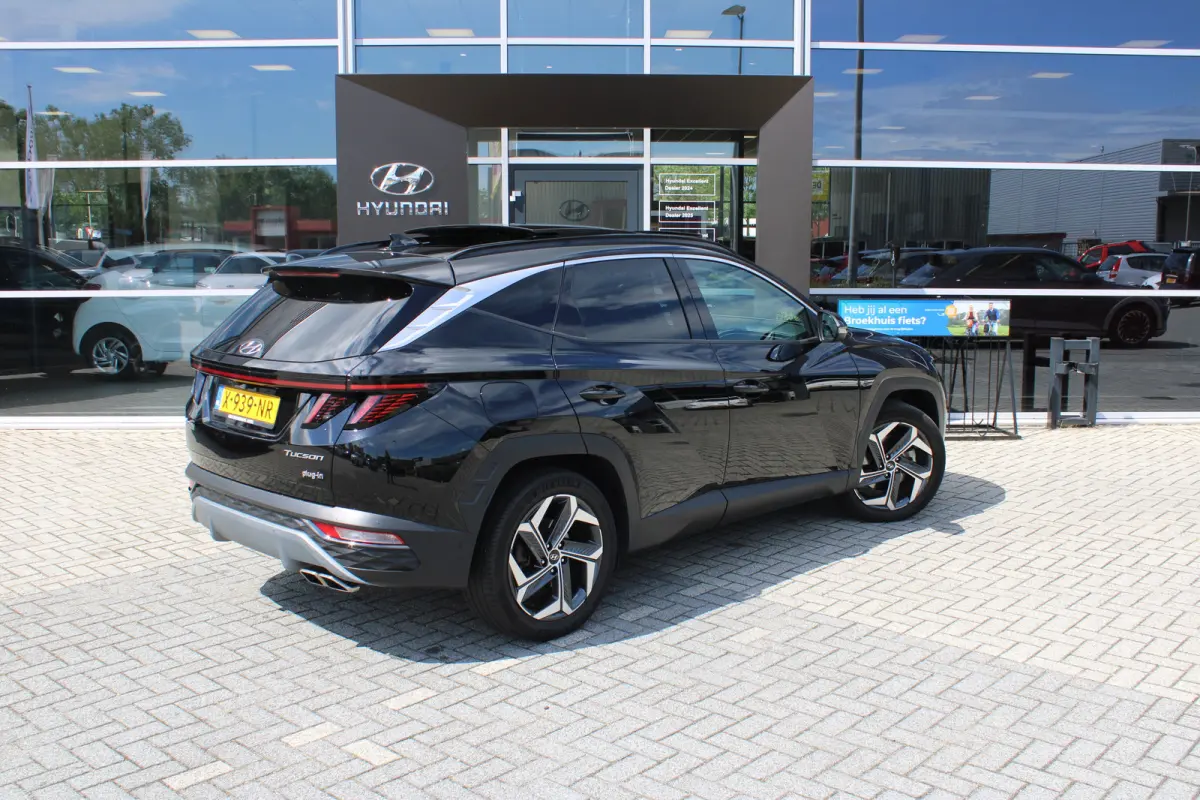 1.6 T-GDI 265pk PHEV Premium Sky 4WD | Schuifkanteldak | 360 camera | Lederen bekleding | | Achterbank verwarmd | Achteruitrij assistent | Airco (automatisch)