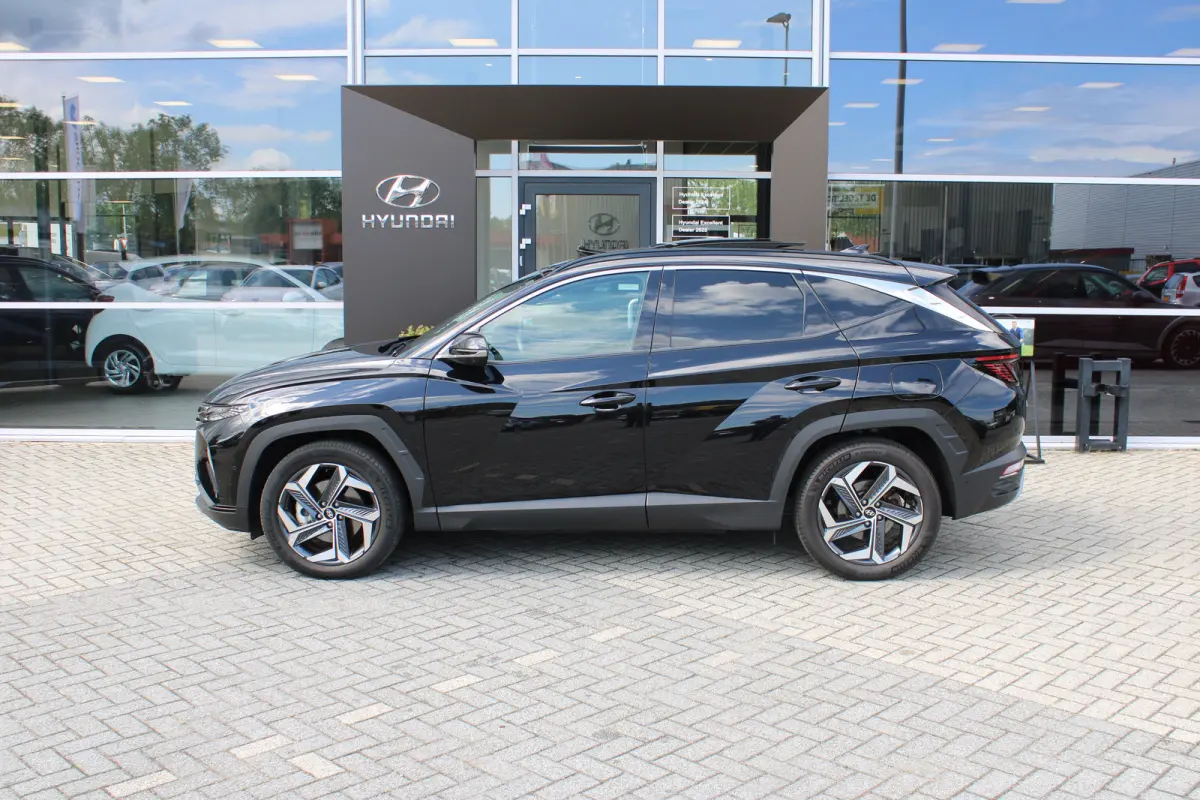 1.6 T-GDI 265pk PHEV Premium Sky 4WD | Schuifkanteldak | 360 camera | Lederen bekleding | | Achterbank verwarmd | Achteruitrij assistent | Airco (automatisch)