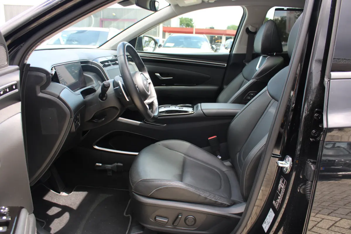 1.6 T-GDI 265pk PHEV Premium Sky 4WD | Schuifkanteldak | 360 camera | Lederen bekleding | | Achterbank verwarmd | Achteruitrij assistent | Airco (automatisch)