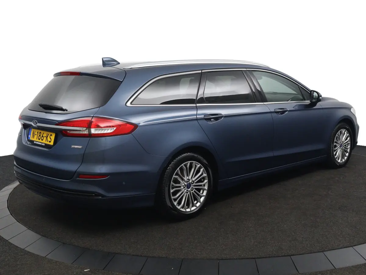 2.0 IVCT HEV Titanium | Camera | Privacy Glass | Navigatie | Cruise Control | Stoelverwarming | Verwarmde Voorruit