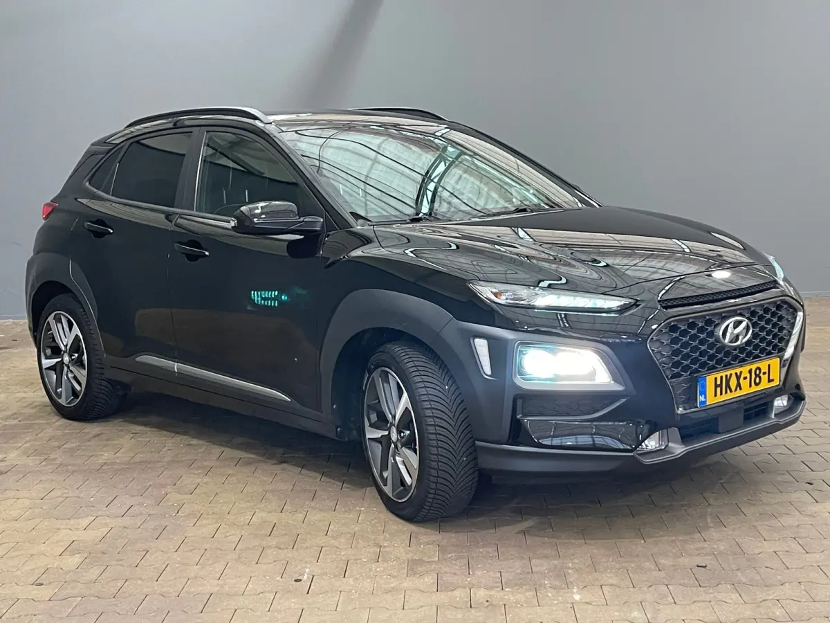 1.6 T-GDI Premium | Head up display | Achteruitrijcamera | Stoelverwarming + stuurwiel verwarming | Krell Audio | Lime Colour Pack | Achteruitrijcamera | Airco (automatisch) | Apple Carplay/