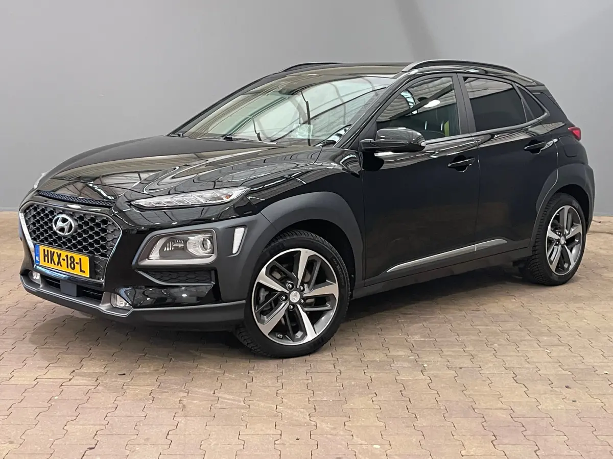 1.6 T-GDI Premium | Head up display | Achteruitrijcamera | Stoelverwarming + stuurwiel verwarming | Krell Audio | Lime Colour Pack | Achteruitrijcamera | Airco (automatisch) | Apple Carplay/