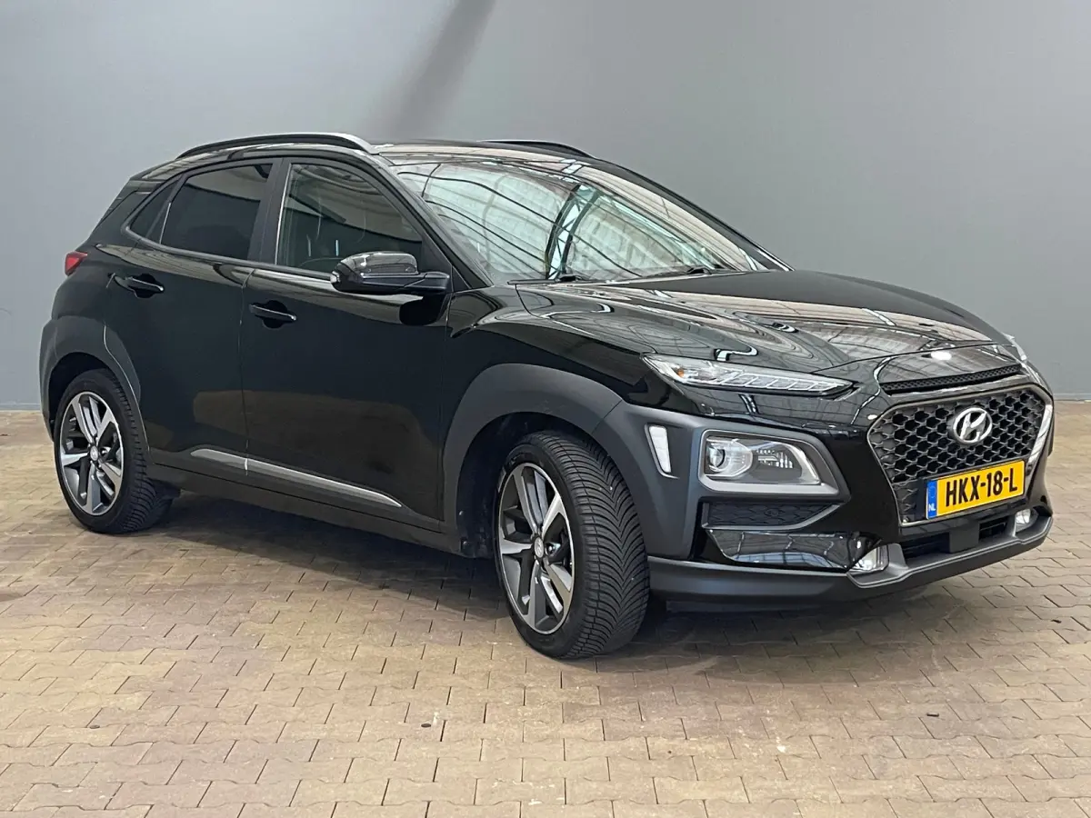 1.6 T-GDI Premium | Head up display | Achteruitrijcamera | Stoelverwarming + stuurwiel verwarming | Krell Audio | Lime Colour Pack | Achteruitrijcamera | Airco (automatisch) | Apple Carplay/