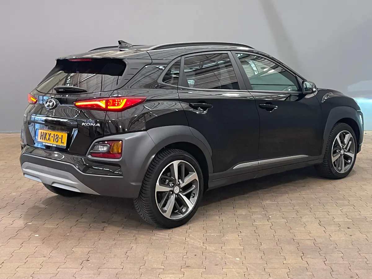 1.6 T-GDI Premium | Head up display | Achteruitrijcamera | Stoelverwarming + stuurwiel verwarming | Krell Audio | Lime Colour Pack | Achteruitrijcamera | Airco (automatisch) | Apple Carplay/