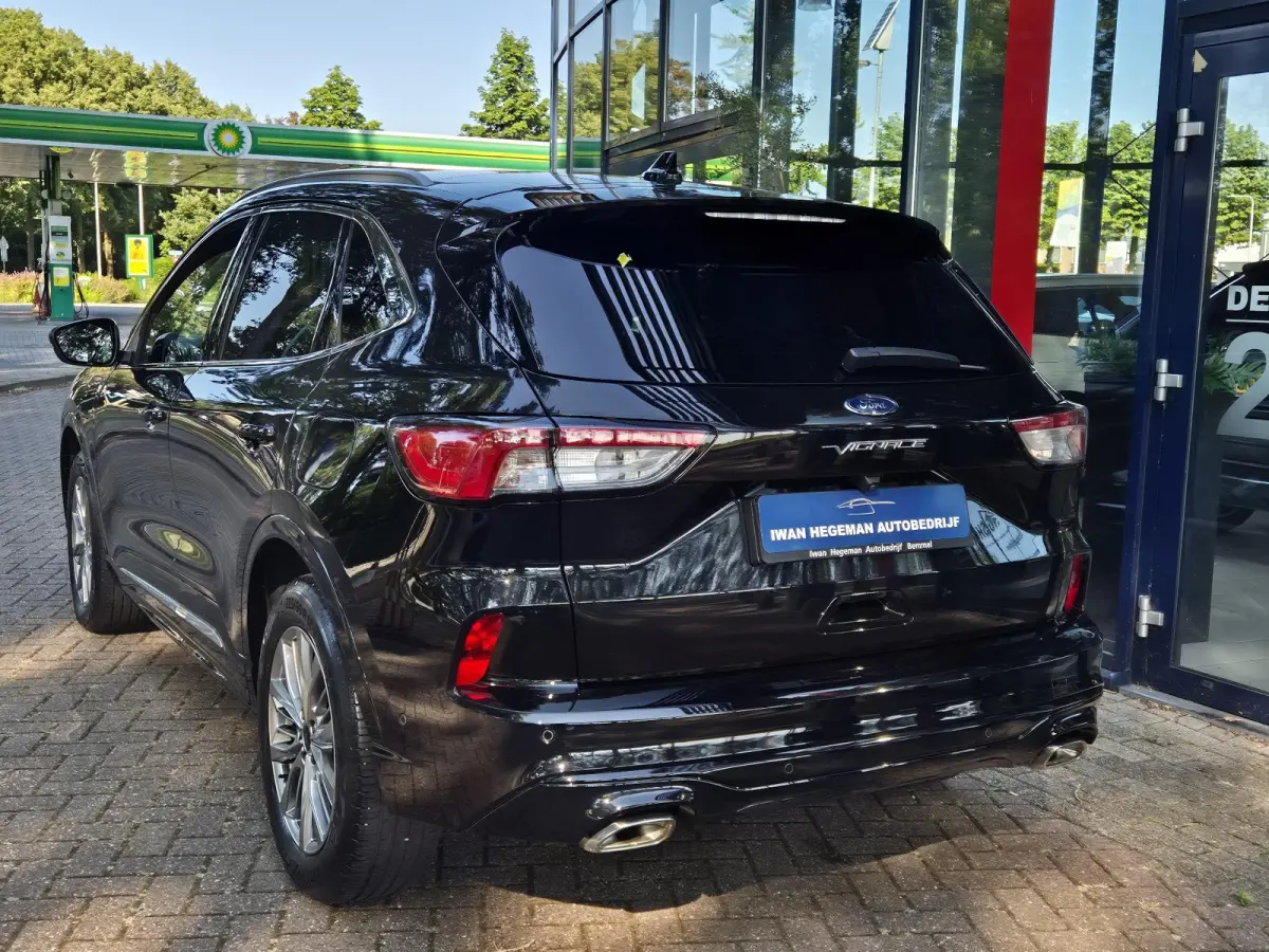 2.5 PHEV Vignale | SOH 85% | Schuif/kantel dak | Leer | Navigatie | Stuur + Stoel + voorruitverwarming | Cruise Control | Parkeersensoren + Camera