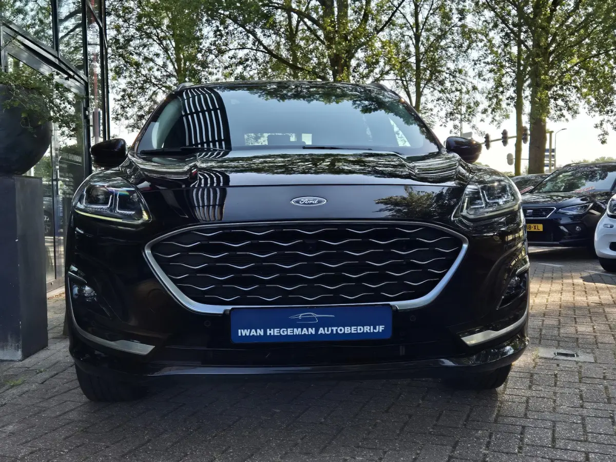 2.5 PHEV Vignale | SOH 85% | Schuif/kantel dak | Leer | Navigatie | Stuur + Stoel + voorruitverwarming | Cruise Control | Parkeersensoren + Camera