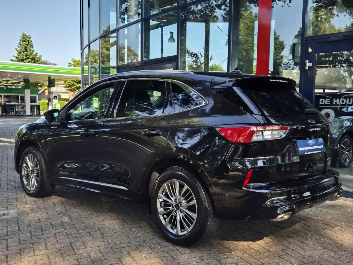 2.5 PHEV Vignale | SOH 85% | Schuif/kantel dak | Leer | Navigatie | Stuur + Stoel + voorruitverwarming | Cruise Control | Parkeersensoren + Camera