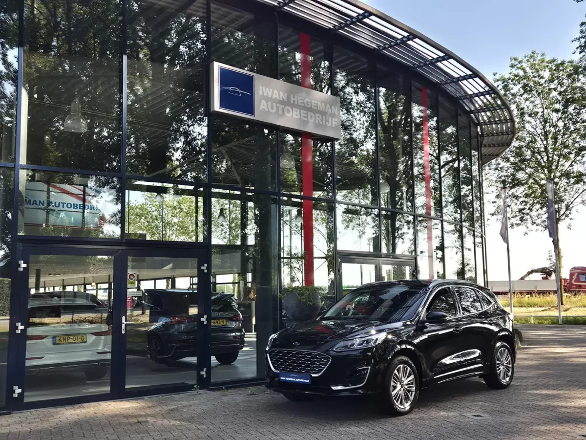 2.5 PHEV Vignale | SOH 85% | Schuif/kantel dak | Leer | Navigatie | Stuur + Stoel + voorruitverwarming | Cruise Control | Parkeersensoren + Camera