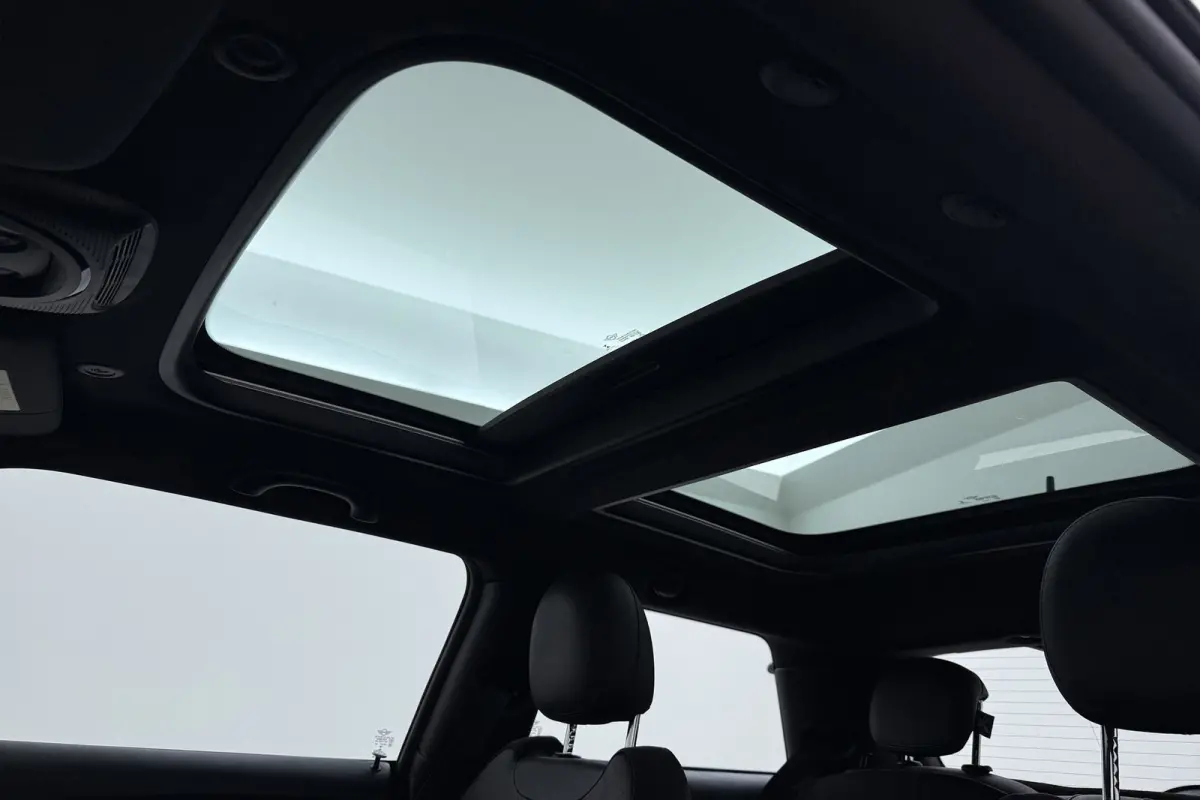 1.5 Cooper Chili | JCW Pakket | Panoramadak | CarPlay | Union Jack Lampen | Climate Control | Sportstoelen | Navi |