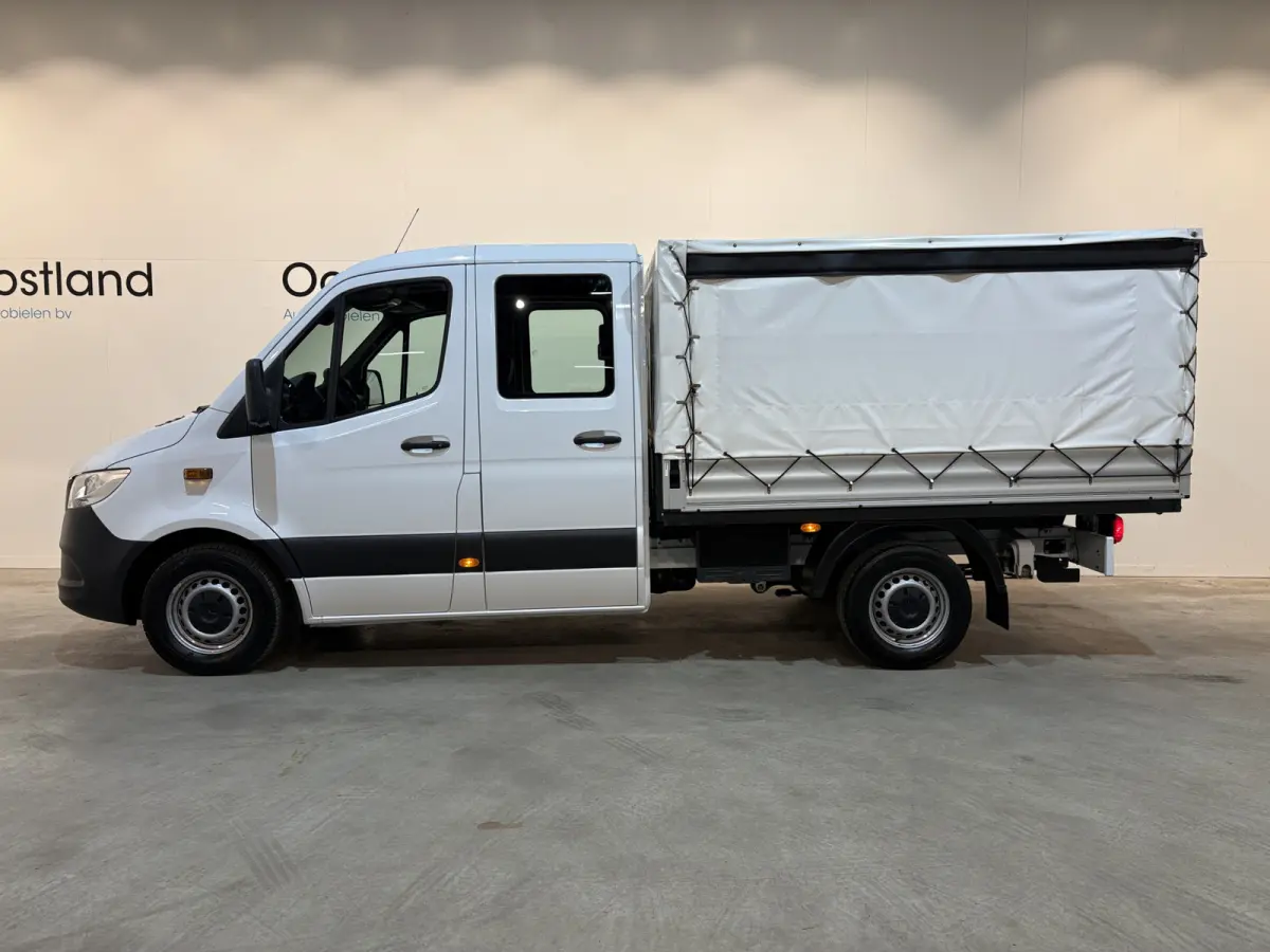 317 CDI L2 RWD DC Open Laadbak met Huif en schuifzeilen / Airco / Cruise / Mbux / Trekhaak