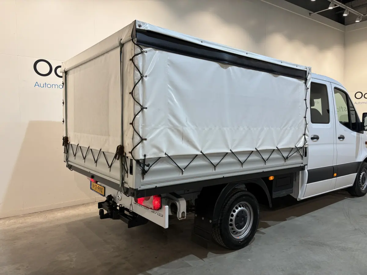 317 CDI L2 RWD DC Open Laadbak met Huif en schuifzeilen / Airco / Cruise / Mbux / Trekhaak