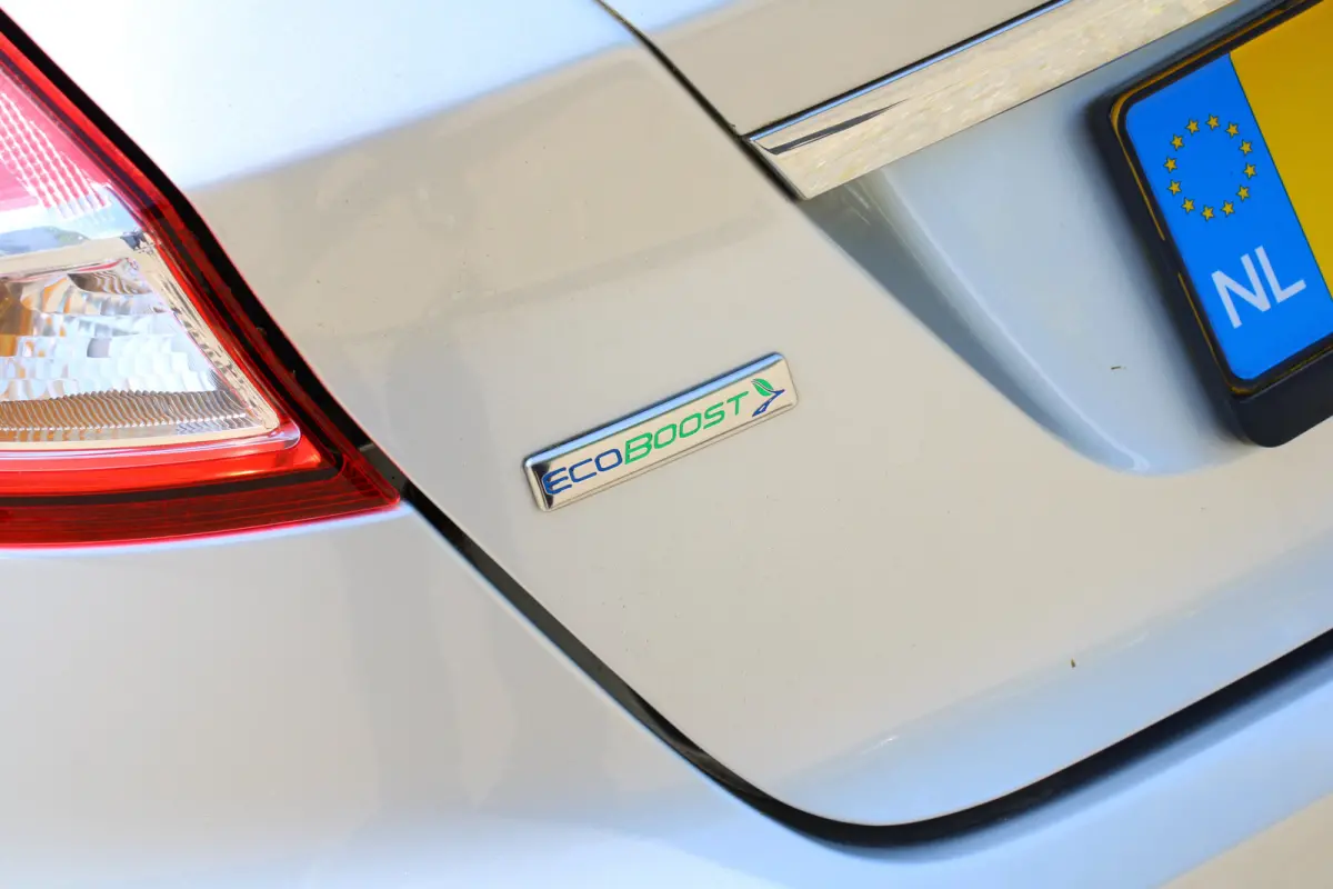 1.0EB Titanium | NL-AUTO! | CRUISE | VOORRUITVERWARMING | NAVI | CLIMA | PARK SENS | ELEKTR. RAMEN