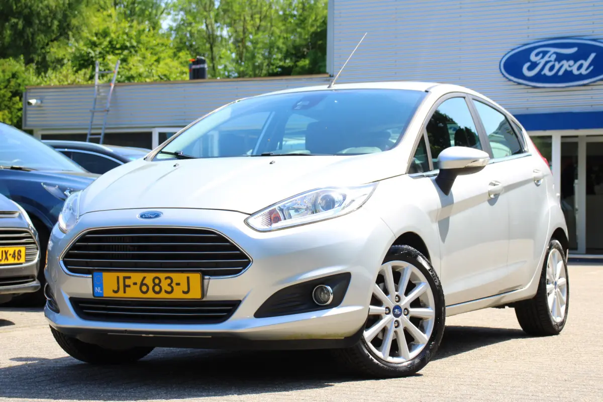 1.0EB Titanium | NL-AUTO! | CRUISE | VOORRUITVERWARMING | NAVI | CLIMA | PARK SENS | ELEKTR. RAMEN