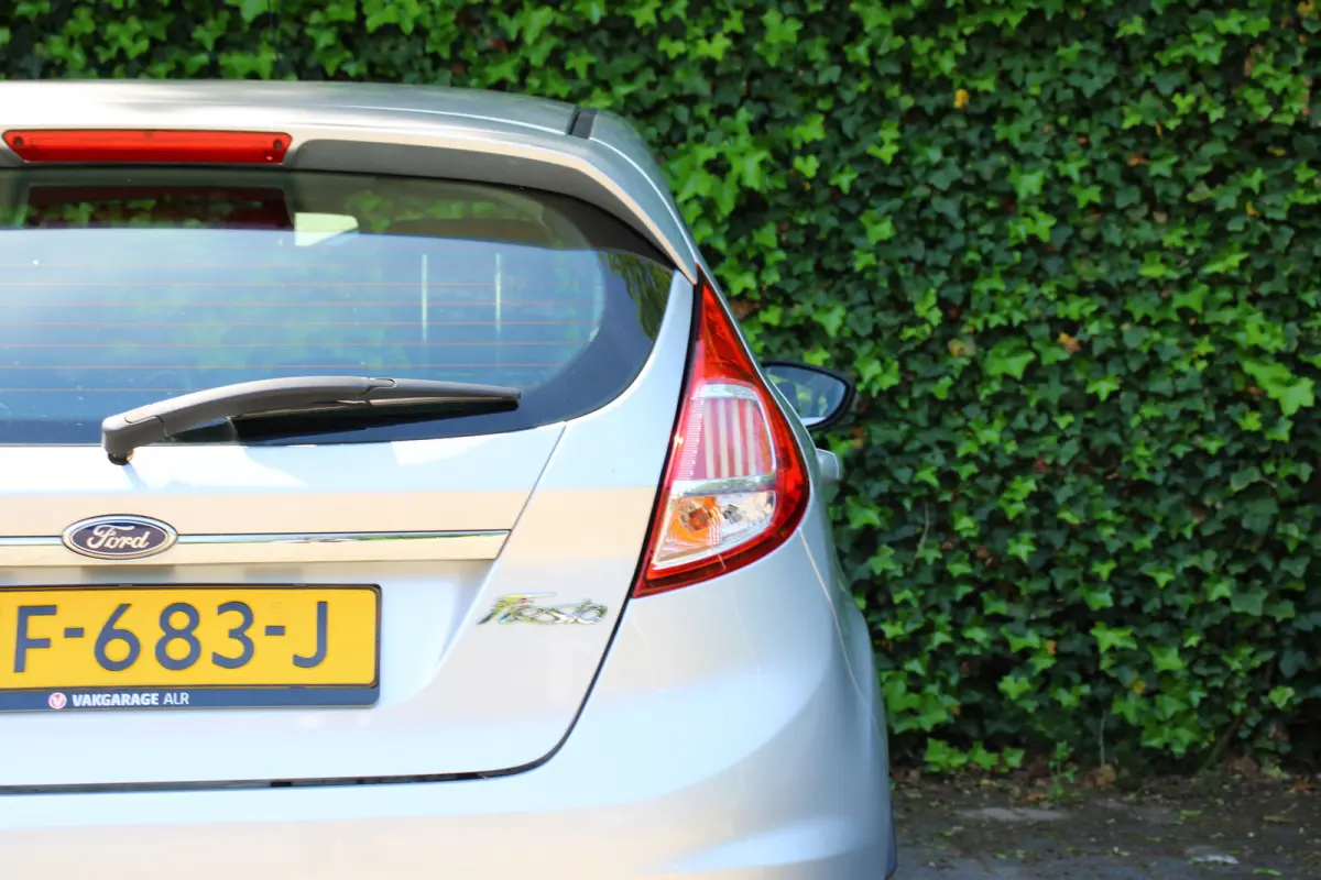 1.0EB Titanium | NL-AUTO! | CRUISE | VOORRUITVERWARMING | NAVI | CLIMA | PARK SENS | ELEKTR. RAMEN