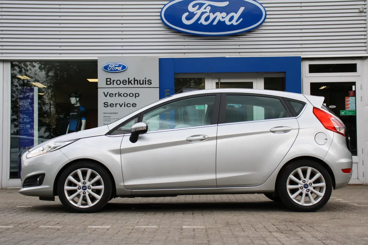 1.0EB Titanium | NL-AUTO! | CRUISE | VOORRUITVERWARMING | NAVI | CLIMA | PARK SENS | ELEKTR. RAMEN