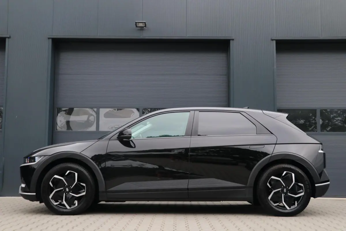Style 58 kWh AdaptiveCruise Warmtepomp Camera AppleCarplay Leder/Stof SOH 100% 79000KM BJ2021