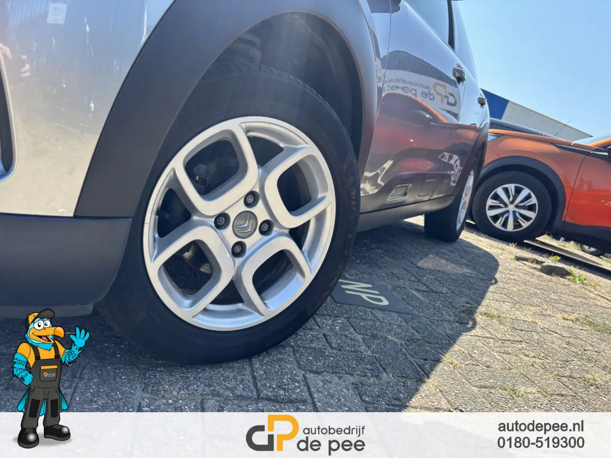 1.2 PureTech Shine GARANTIE/NW.DISTRI/CARPLAY/CLIMA/CRUISE/CAMERA/PDC/LICHTMETAAL/TREKHAAK rijklaarprijs!