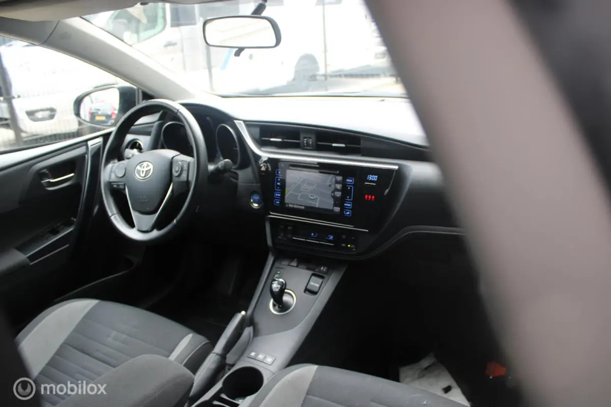 1.8 Hybrid Trend NL Auto | 1e Eigenaar | Panoramadak | Navigatie.