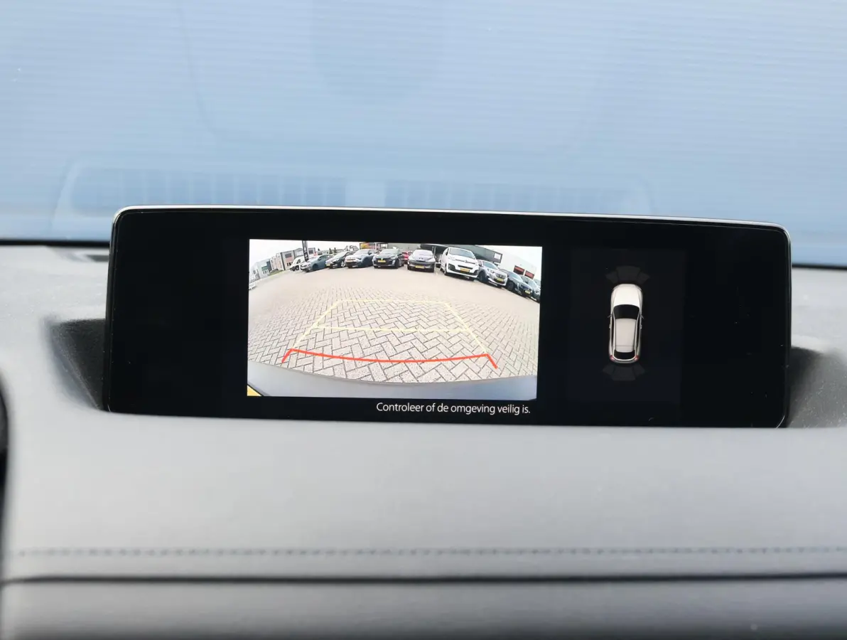 e-SkyActiv EV 145 Advantage 36 kWh Camera | ACCU 95% | Elektrisch verstelbare stoelen | LEER | Stoelverwarming | Navigatie | Climate Control Tweezeidig | Apple CarPlay & Android Auto