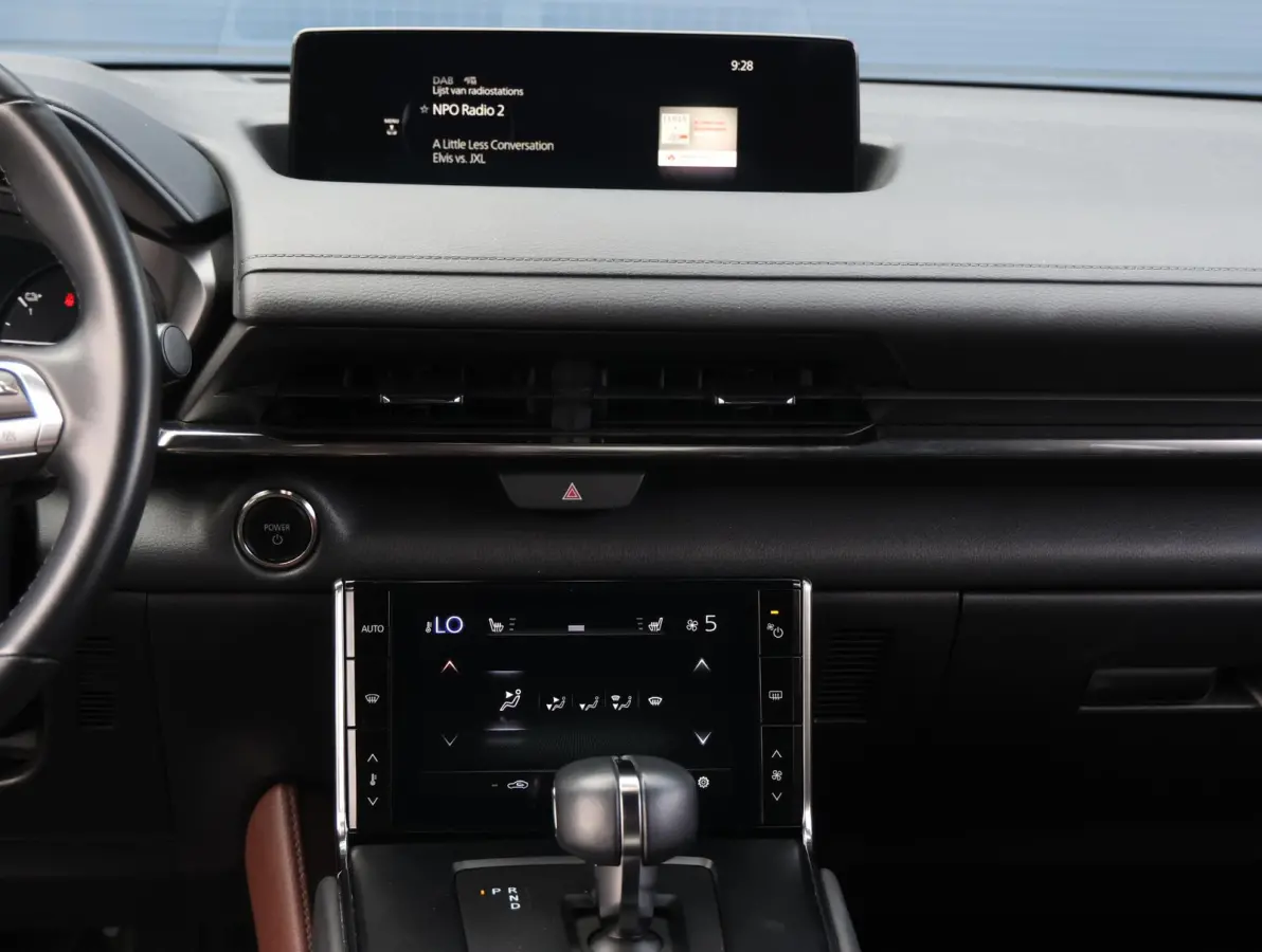 e-SkyActiv EV 145 Advantage 36 kWh Camera | ACCU 95% | Elektrisch verstelbare stoelen | LEER | Stoelverwarming | Navigatie | Climate Control Tweezeidig | Apple CarPlay & Android Auto