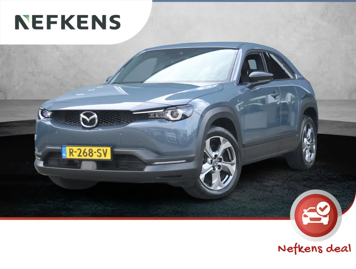 e-SkyActiv EV 145 Advantage 36 kWh Camera | ACCU 95% | Elektrisch verstelbare stoelen | LEER | Stoelverwarming | Navigatie | Climate Control Tweezeidig | Apple CarPlay & Android Auto